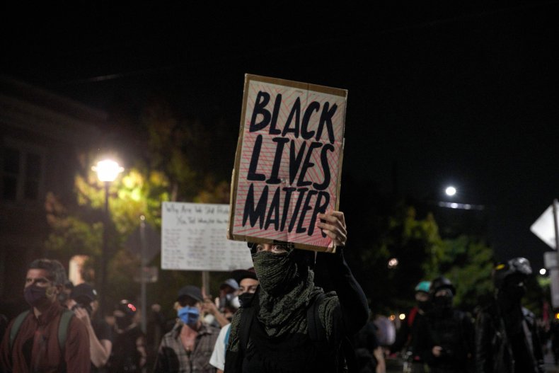 Portland Protester Says 'I Can't Walk' as She Is Carried
Away by Police 1