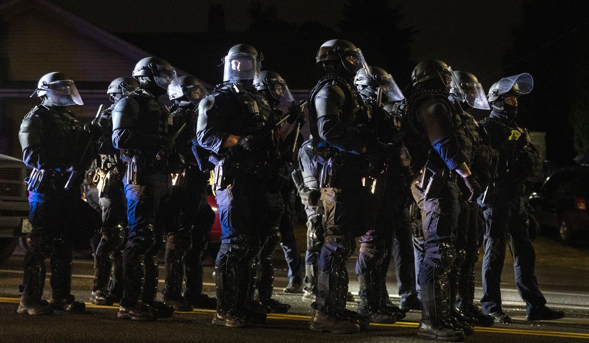 Portland protests set up clash between journalists,
police 1
