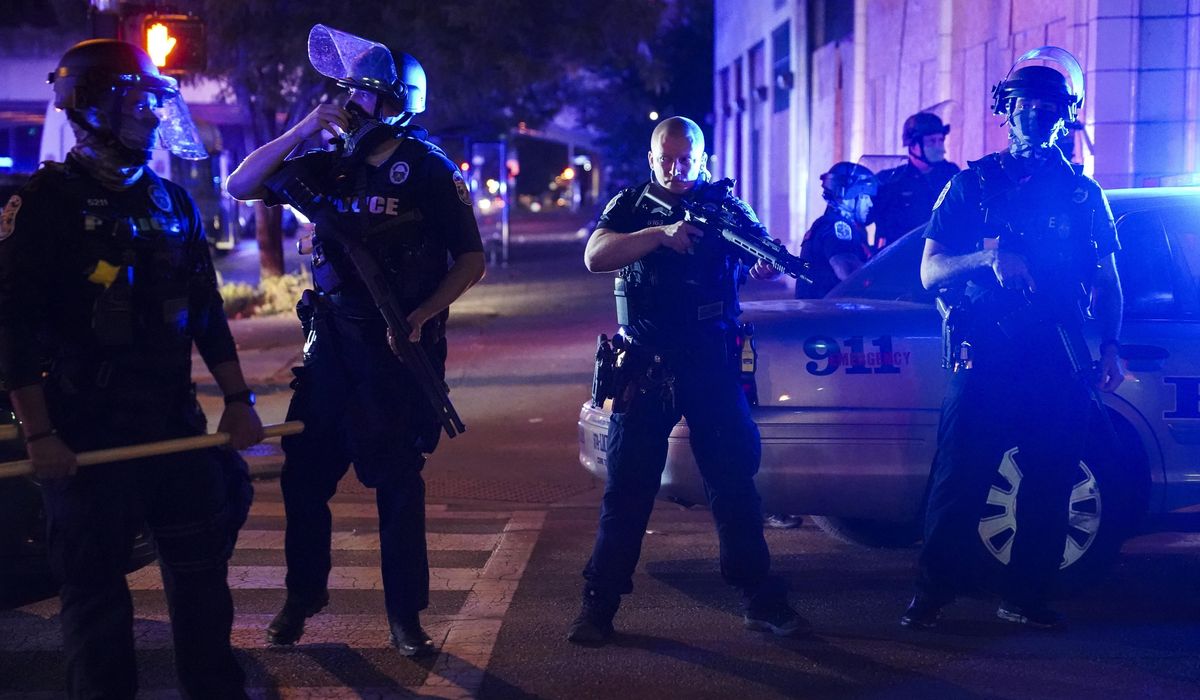 With anger at police high, officers face greater
danger 1