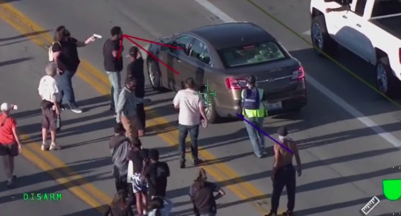 Protester Arrested for Brandishing Gun Acted In Self
Defense, Lawyer Says, May Sue Police 1