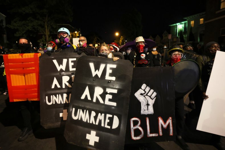 Naked Protesters in Rochester Wear 'Spit Hoods' to Protest
Daniel Prude's Death 1