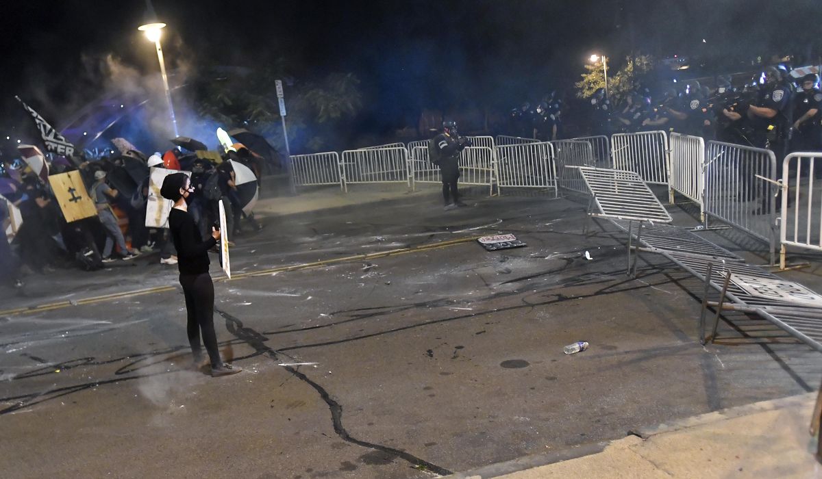 9 arrested during ongoing protests over Prude's
death 1