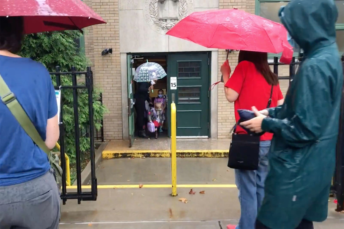 NYC elementary school students react to their first day back
since COVID-19 1