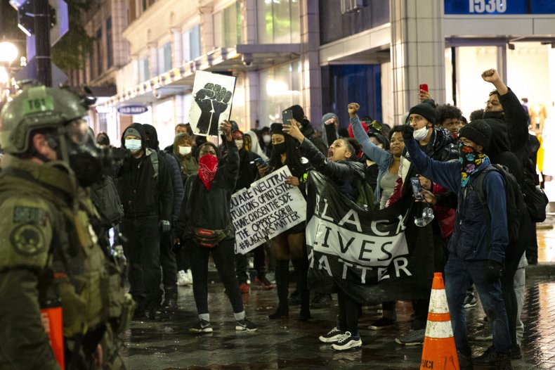 Seattle Officer Held Knee on Protester's Neck for Nearly 13
Seconds Days After George Floyd's Death, Report Says 1