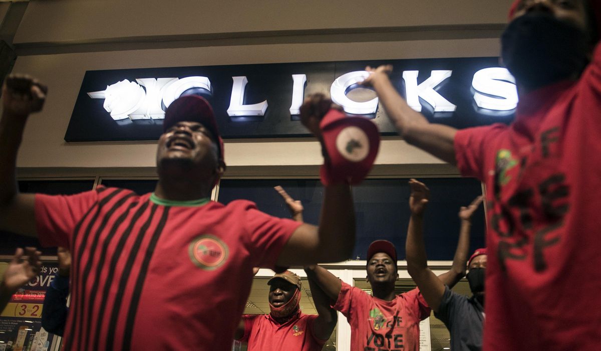 South African protesters close stores over offensive
ad 1