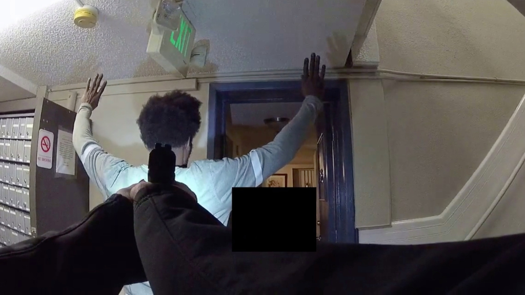 Denver police officer suspended for Tasing man in the back
after he was handcuffed 1