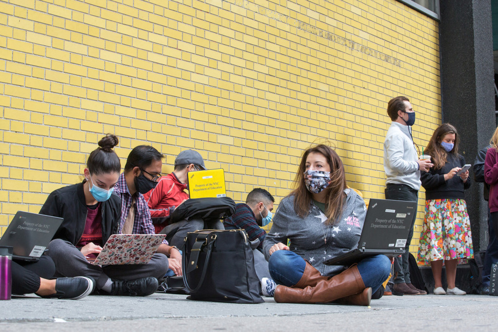 Protesting NYC teachers threatened with docked pay if they
don’t return to class 1