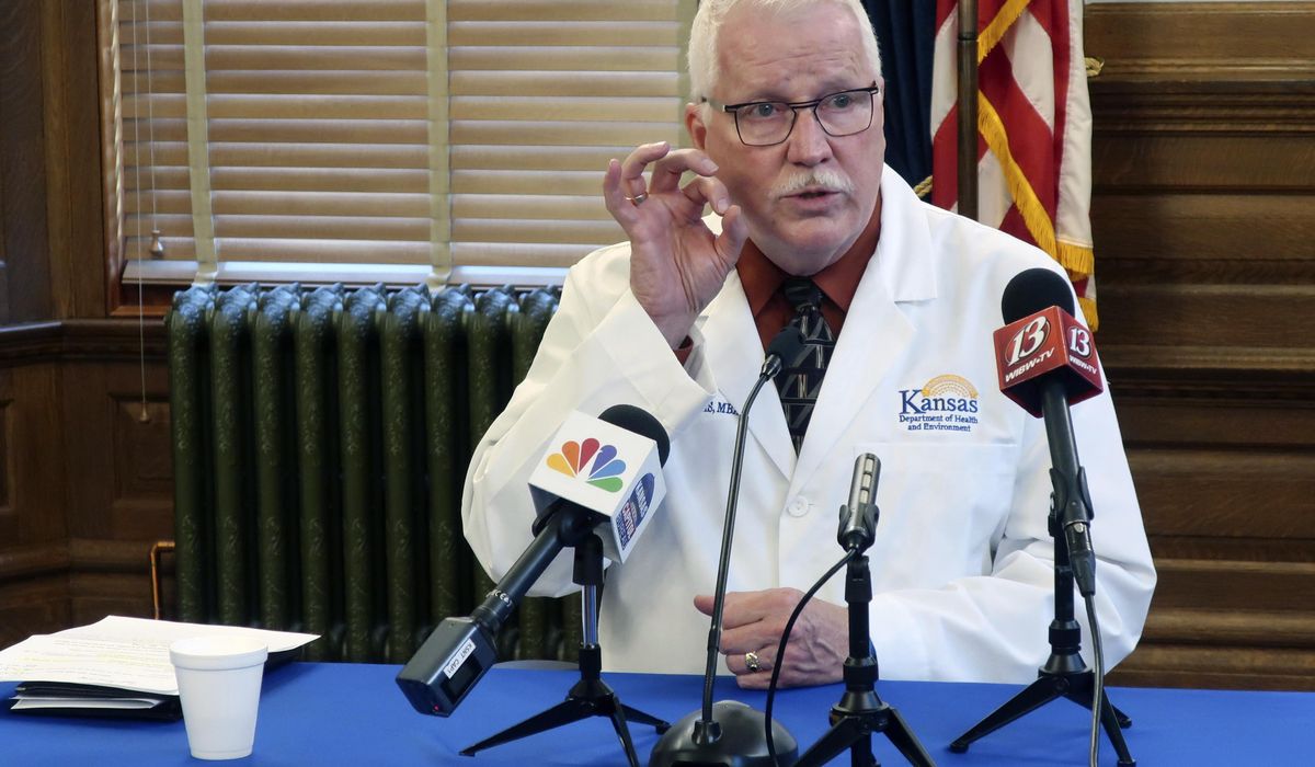 Kansas COVID-19 cases jump by 1,300-plus with rural
spikes 1