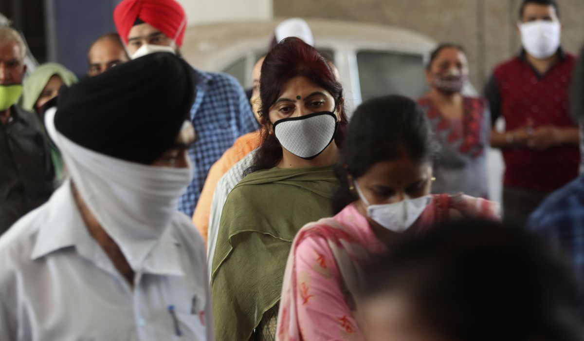 The Latest: Pakistan to start opening schools as cases
fall 1