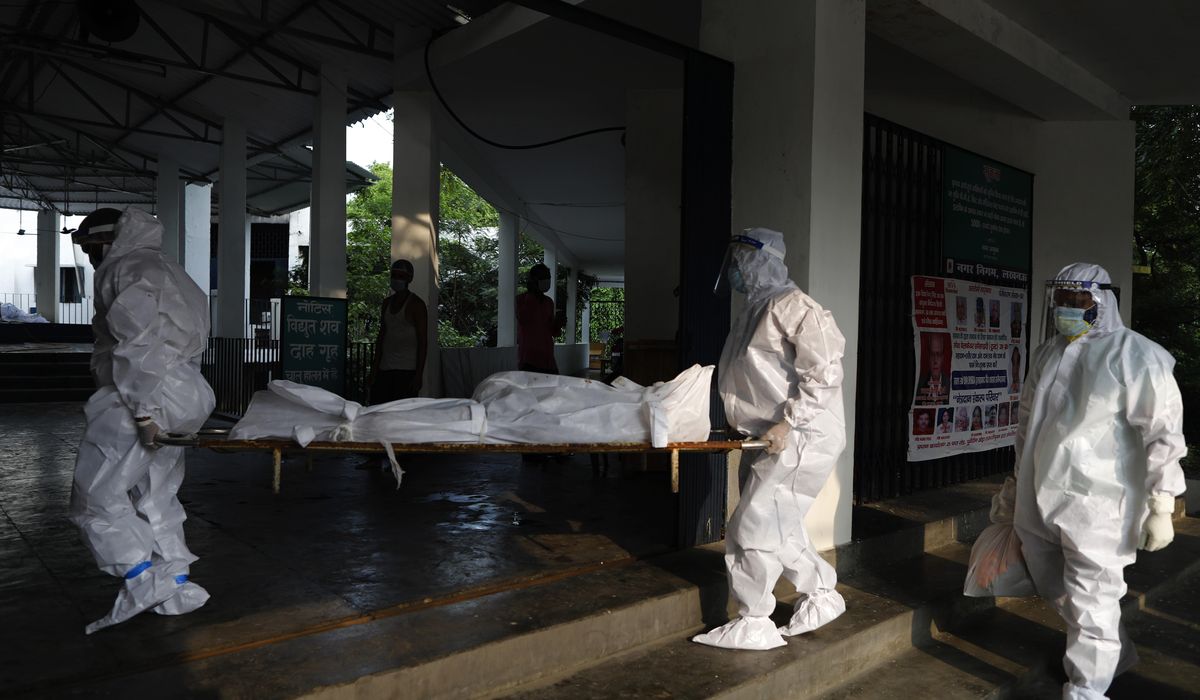 The Latest: Parliament opens in India, global virus hot
spot 1