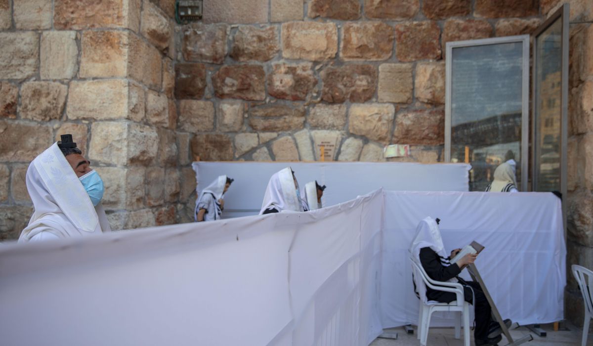 Israeli minister resigns to protest expected virus
lockdown 1