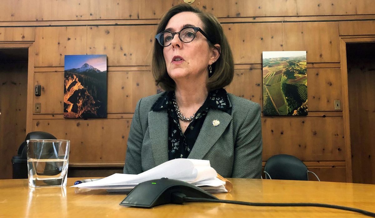 Kate Brown, Oregon governor, wants review of police response
to Portland protest 1