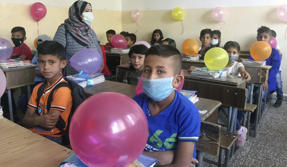 Syria's schools open amid anti-coronavirus measures 1