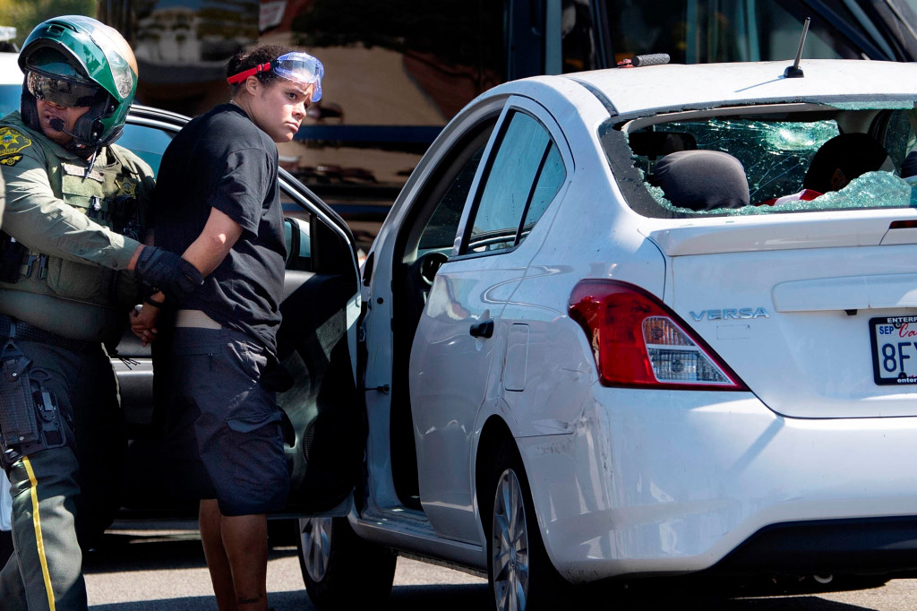 BLM leader begged cops for help before driving through
counter-protesters: lawyer 1