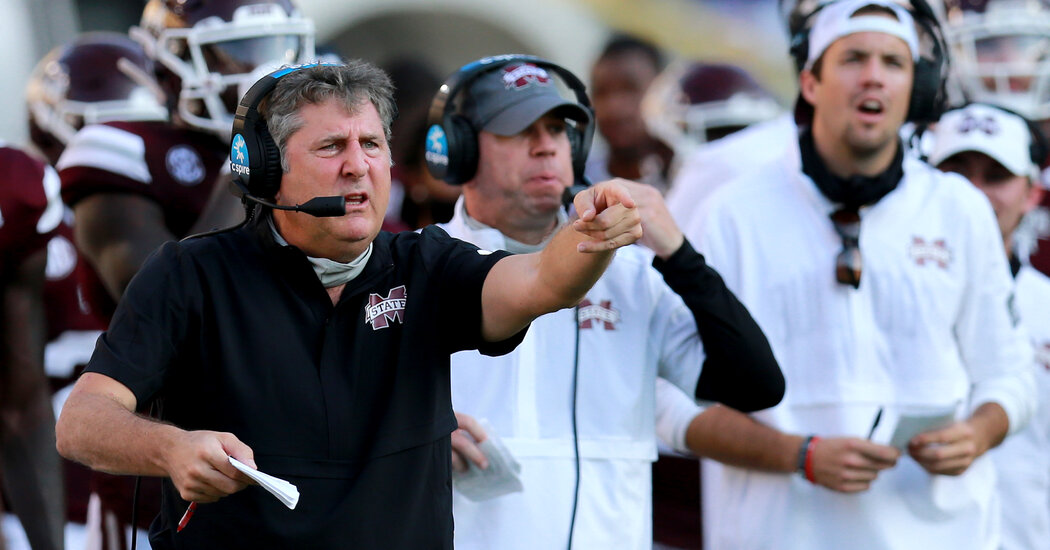 Football’s Return Is Fodder for Mask Debates and an
Enforcement Dilemma 1