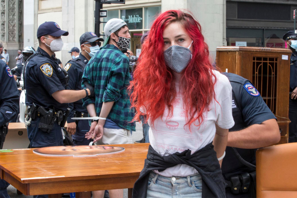 Protesters demanding eviction protection set up living room
outside City Hall 1