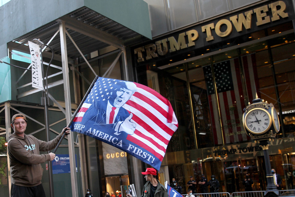 Trump supporters close 5th Ave. to support COVID-19-stricken
president 1