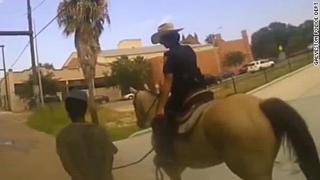A Black man who was led through Galveston, Texas, by police
officers on horseback is suing the city for $1 million 1