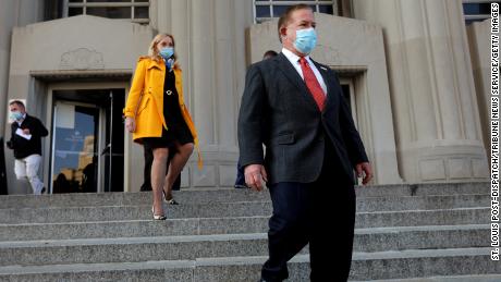 St. Louis couple who pointed guns at protesters plead not
guilty to charges 1