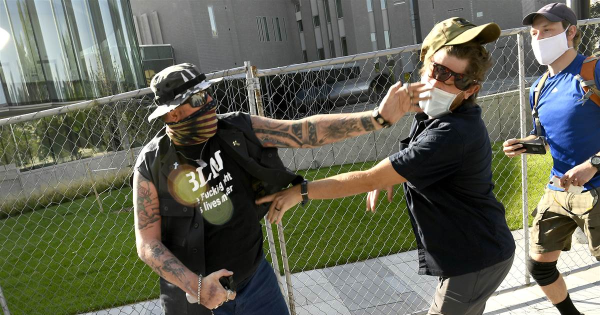 Security guard faces second-degree murder charge after
killing at dueling protests in Denver 1