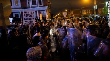 Philadelphia police ask residents to stay indoors during
protests over fatal police shooting of Walter Wallace Jr. 1