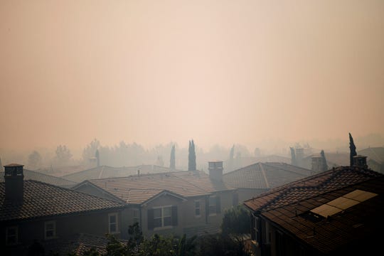 In California: Fires blaze in the OC; wear a mask while
cheering the Dodgers 1
