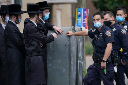 New virus restrictions in New York spark anti-lockdown
protests in Orthodox Jewish community 1