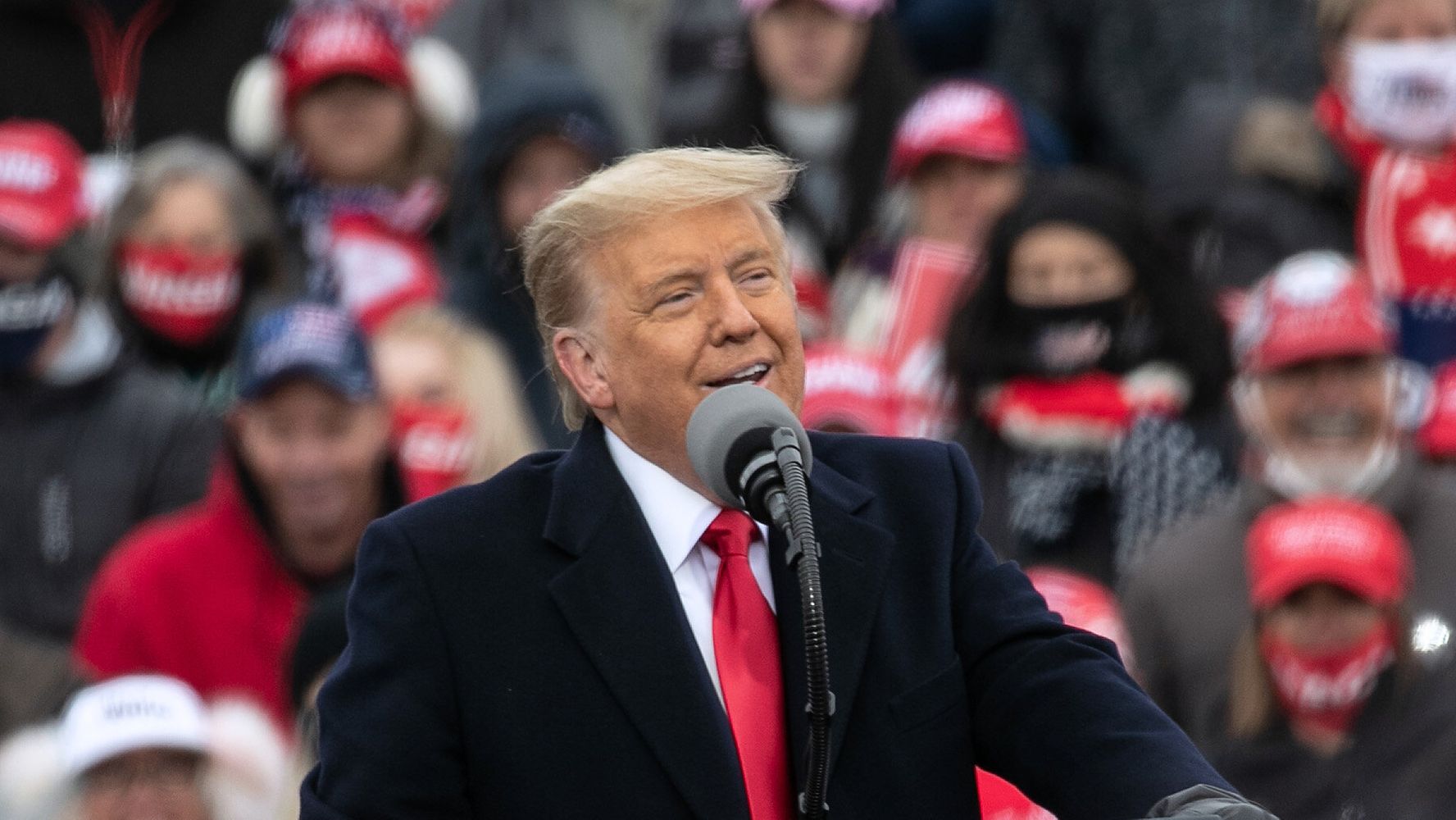 Trump Mocks ‘Politically Correct’ Laura Ingraham For Wearing
Mask At Packed Rally 1