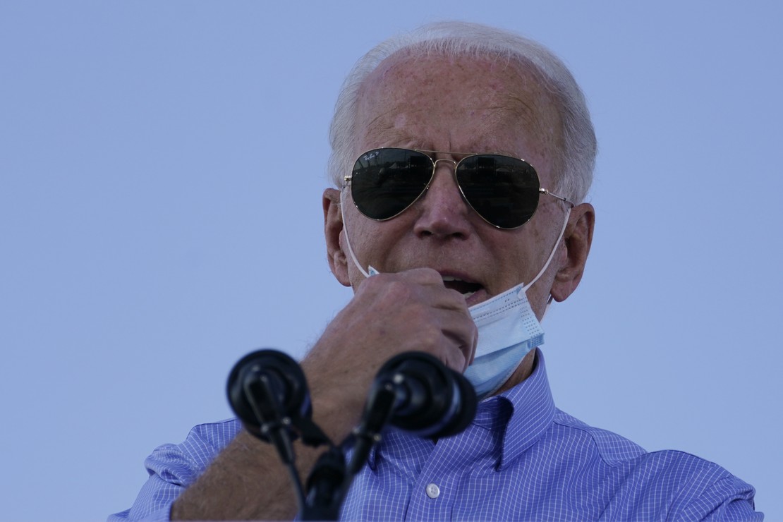 [WATCH] Mask-Shamer Joe Biden Literally Removed His Mask to
Cough 1