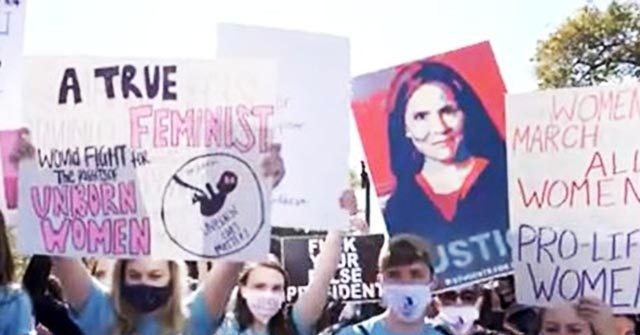 Watch: Amy Coney Barrett Supporters Block Feminist
Protesters Outside the Supreme Court 1