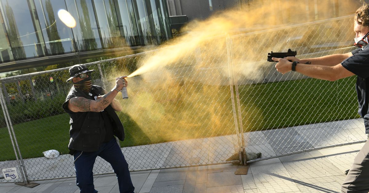 Guard working for TV station in custody after man dies in
shooting at Denver protests 1