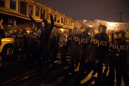 At least 30 officers injured amid protests in Philadelphia
after police fatally shoot armed Black man 1 At least 30 officers injured amid protests in Philadelphia
after police fatally shoot armed Black man 1