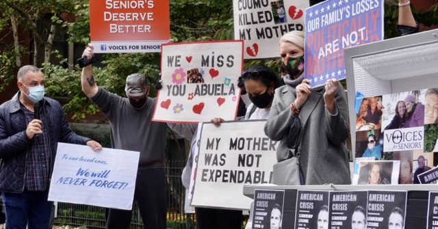 Grieving New York Families Hold 'Funeral' for Andrew Cuomo's
Coronavirus Book at Nursing Home 1