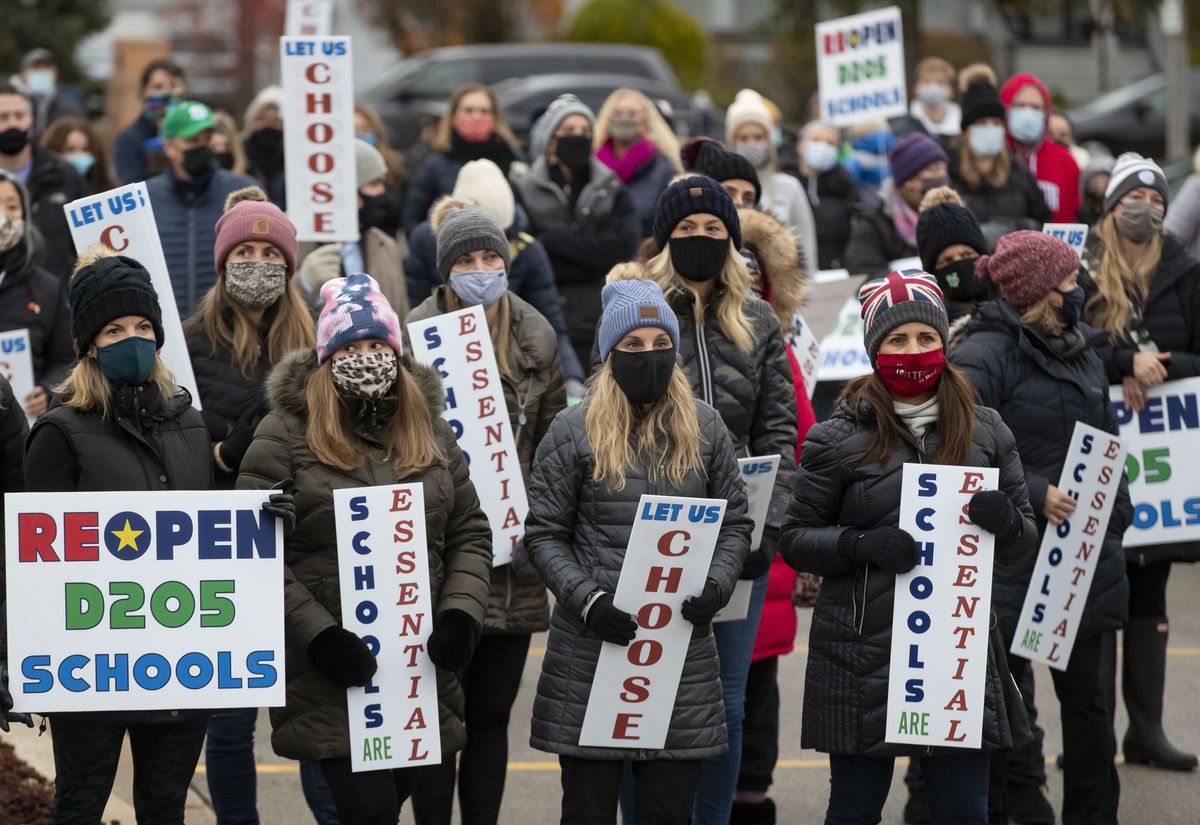 In the fight over reopening schools amid the pandemic, race
and class divisions are stark 1 In the fight over reopening schools amid the pandemic, race
and class divisions are stark 1
