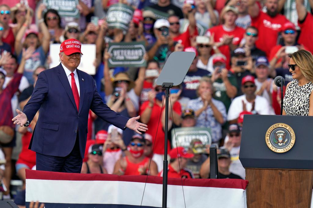 As coronavirus surges, Trump rallies keep packing in
thousands 1