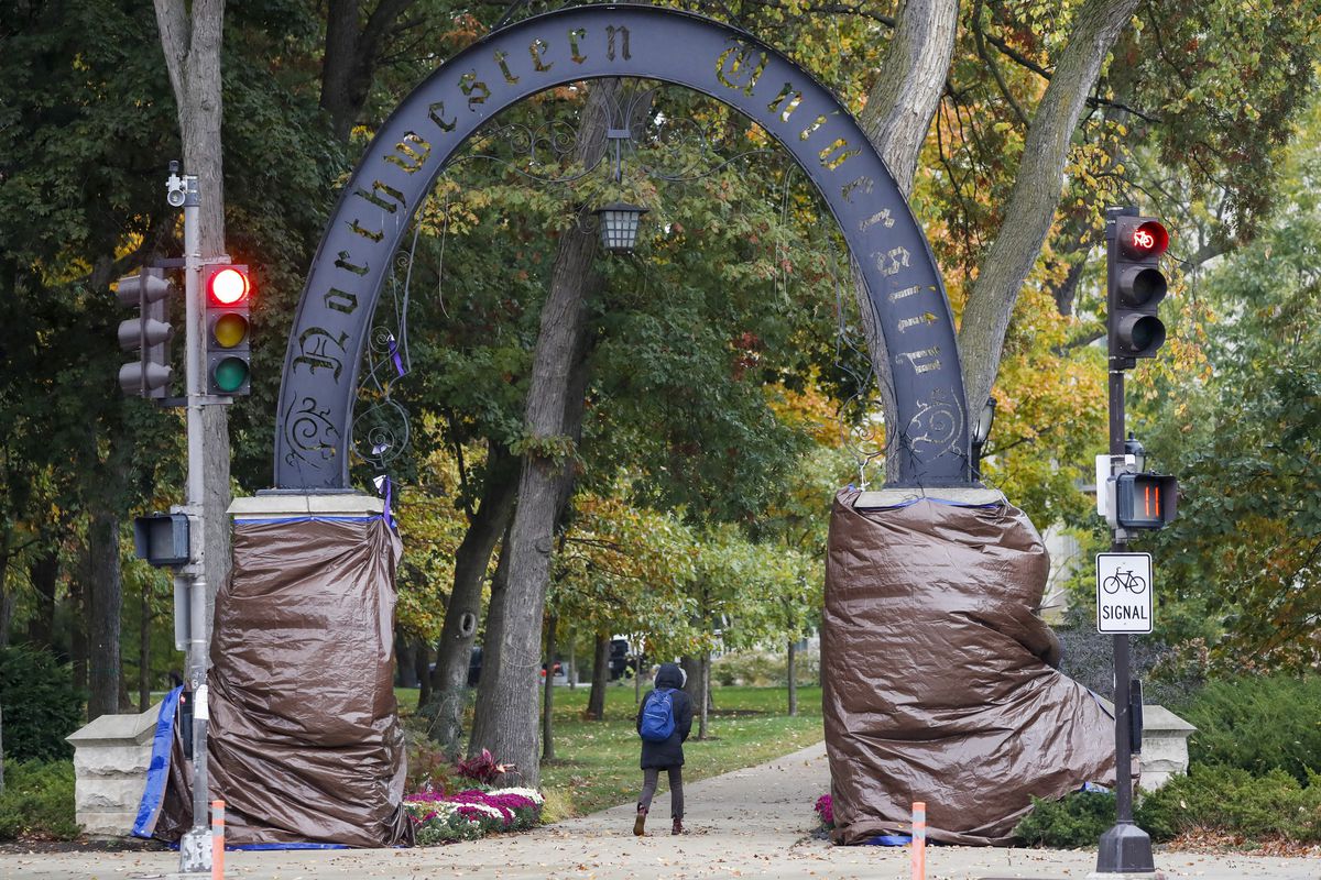 ‘Disgusted’ NU president condemns students who burned banner
outside his house and vandalized campus during protests against
police 1 ‘Disgusted’ NU president condemns students who burned banner
outside his house and vandalized campus during protests against
police 1