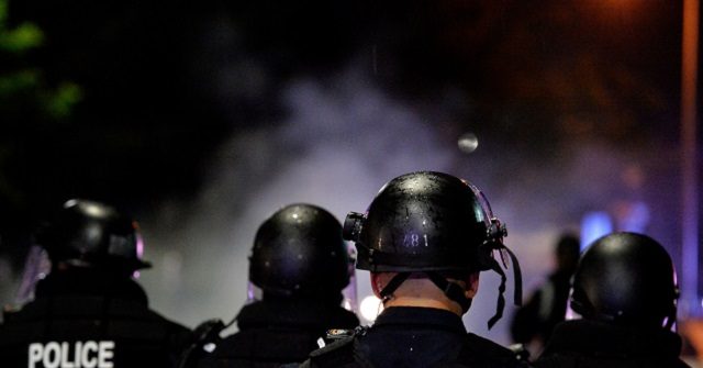 Anti-Cop Rioters Throw Fireworks, Bricks, Bottles at Rhode
Island Police 1