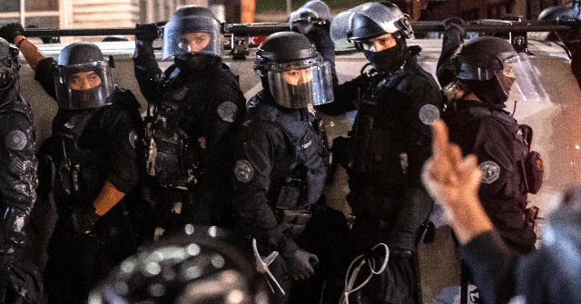 Police Make Mass Arrest Overnight in Riot-Torn Portland
Oregon 1