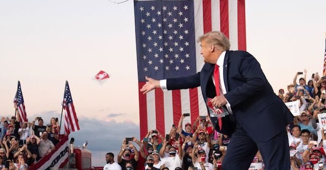 Donald Trump Tosses MAGA Coronavirus Masks to Rally Crowd in
Florida 1