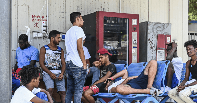 Tensions at Italian Migrant Centre Under Quarantine Erupt
into Violence 1