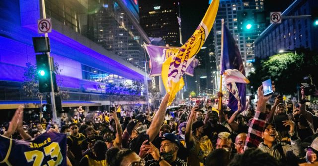 WATCH: 'Mostly Peaceful' Lakers Fans Party Outside Staples
Center; Few Masks, LAPD Car Attacked 1