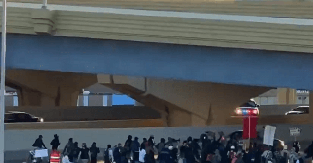 Watch: Police in Wisconsin Begin Arresting Rioters Blocking
Freeway 1