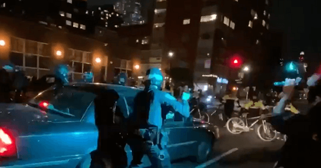 Watch: Car Drives into Line of NYPD Cops During Protest, At
Least One Officer Wounded 1
