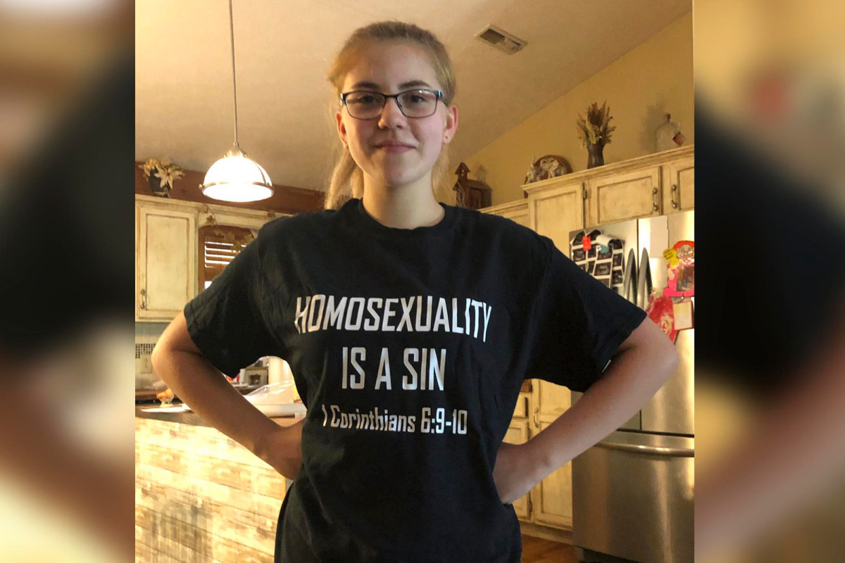 Preacher says daughter was booted from class for
‘Homosexuality is a sin’ T-shirt 1