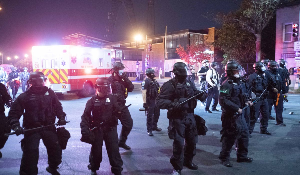 2nd night of protest at D.C. police station over fatal moped
crash 1