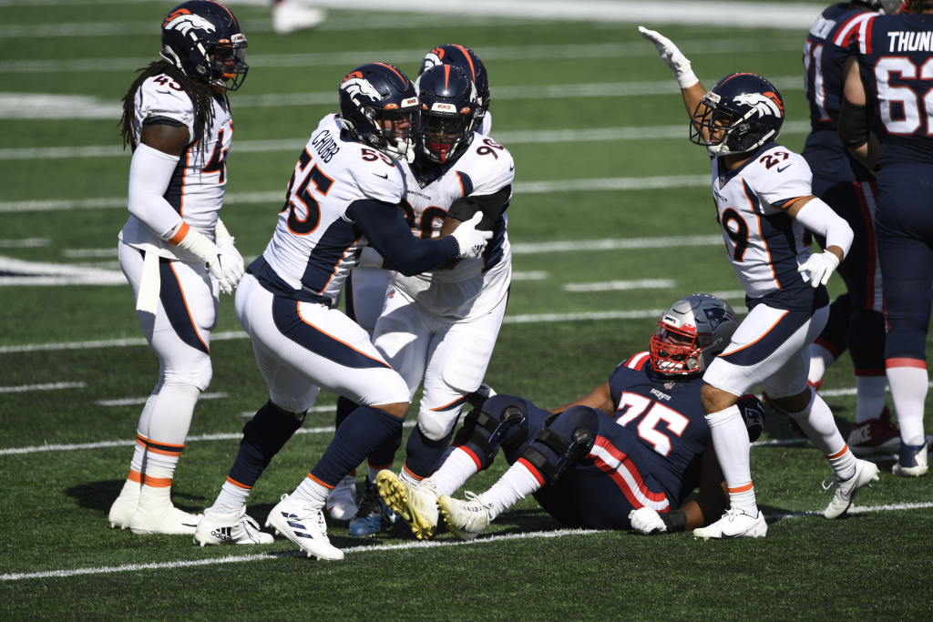 Broncos survive late Patriots rally, get first win in New
England since 2006 1