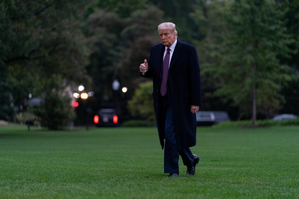The Latest: Pence and his wife test negative for
COVID-19 1
