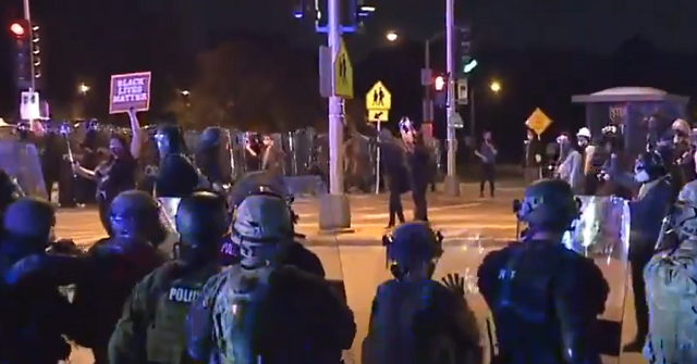 WATCH: Wisconsin Protesters Defy Curfew Orders for Third
Night 1