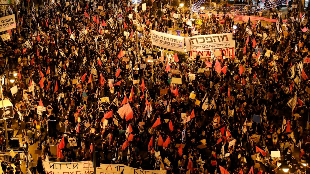 As lockdown eases, Israelis again gather against
Netanyahu 1