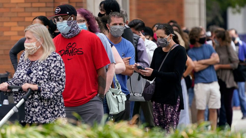 Judge says Texas mask mandate must extend to polling
places 1